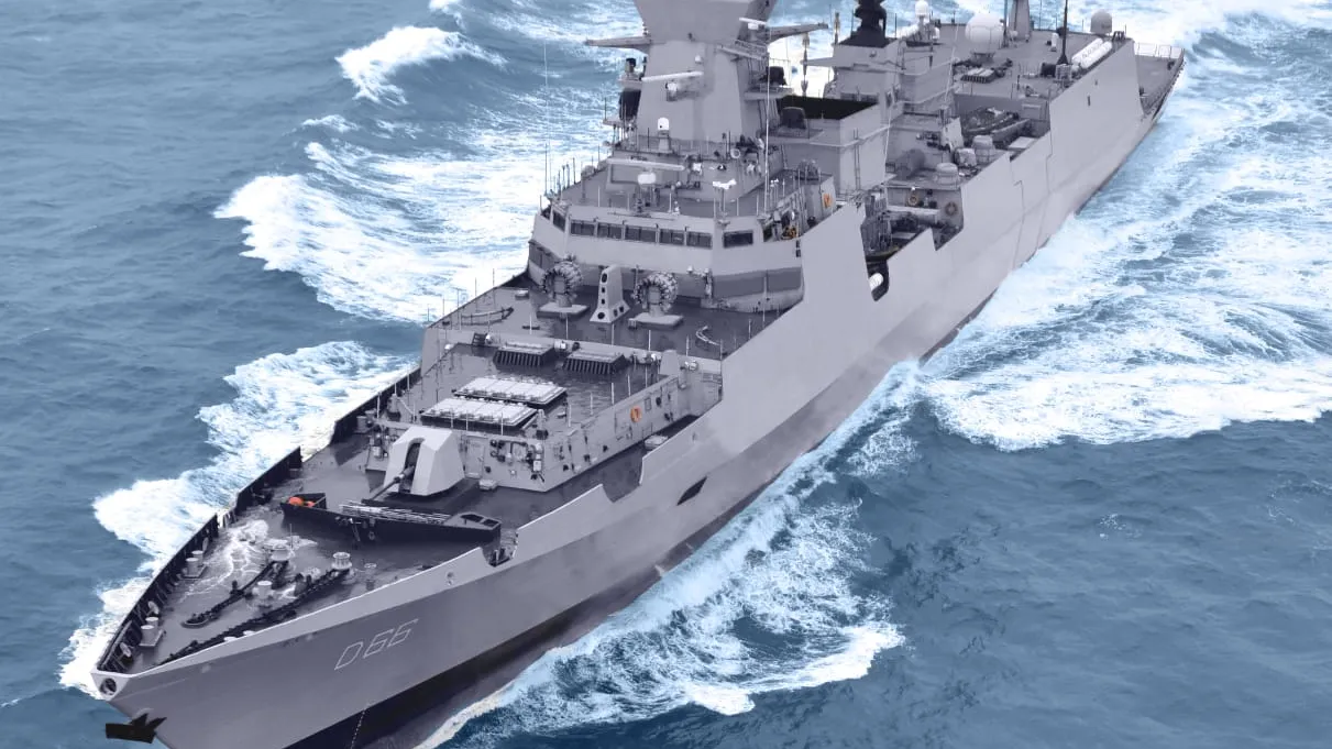 Aerial view of INS Visakhapatnam (D66), an Indian Navy Project 15B guided-missile destroyer, cutting through blue seas during sea trials.